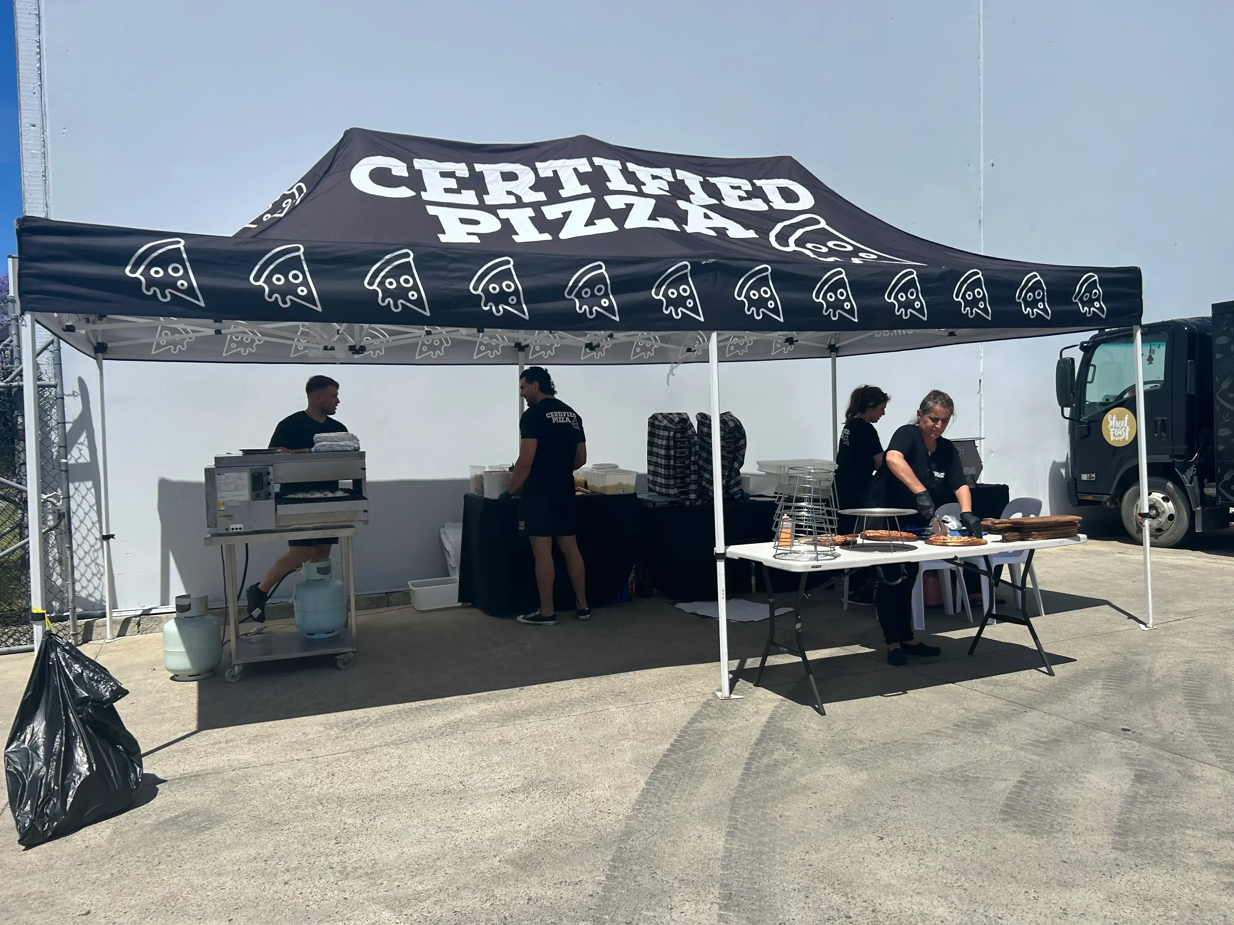 Certified Pizza branded marquee and commercial oven setup at Bravofoods Factory Prestons
