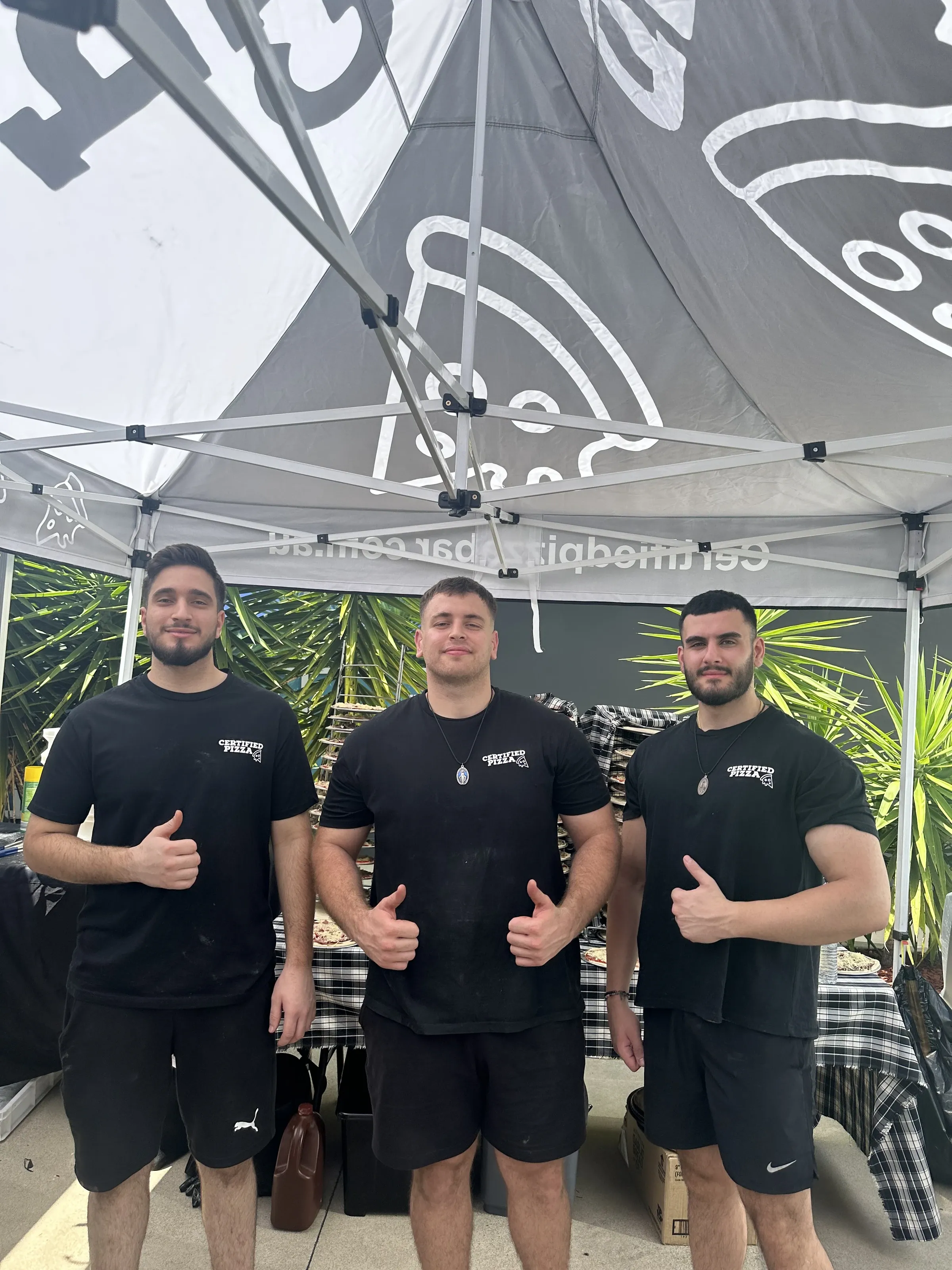 Certified Pizza Catering team at a Komatsu corporate catering event in Fairfield NSW