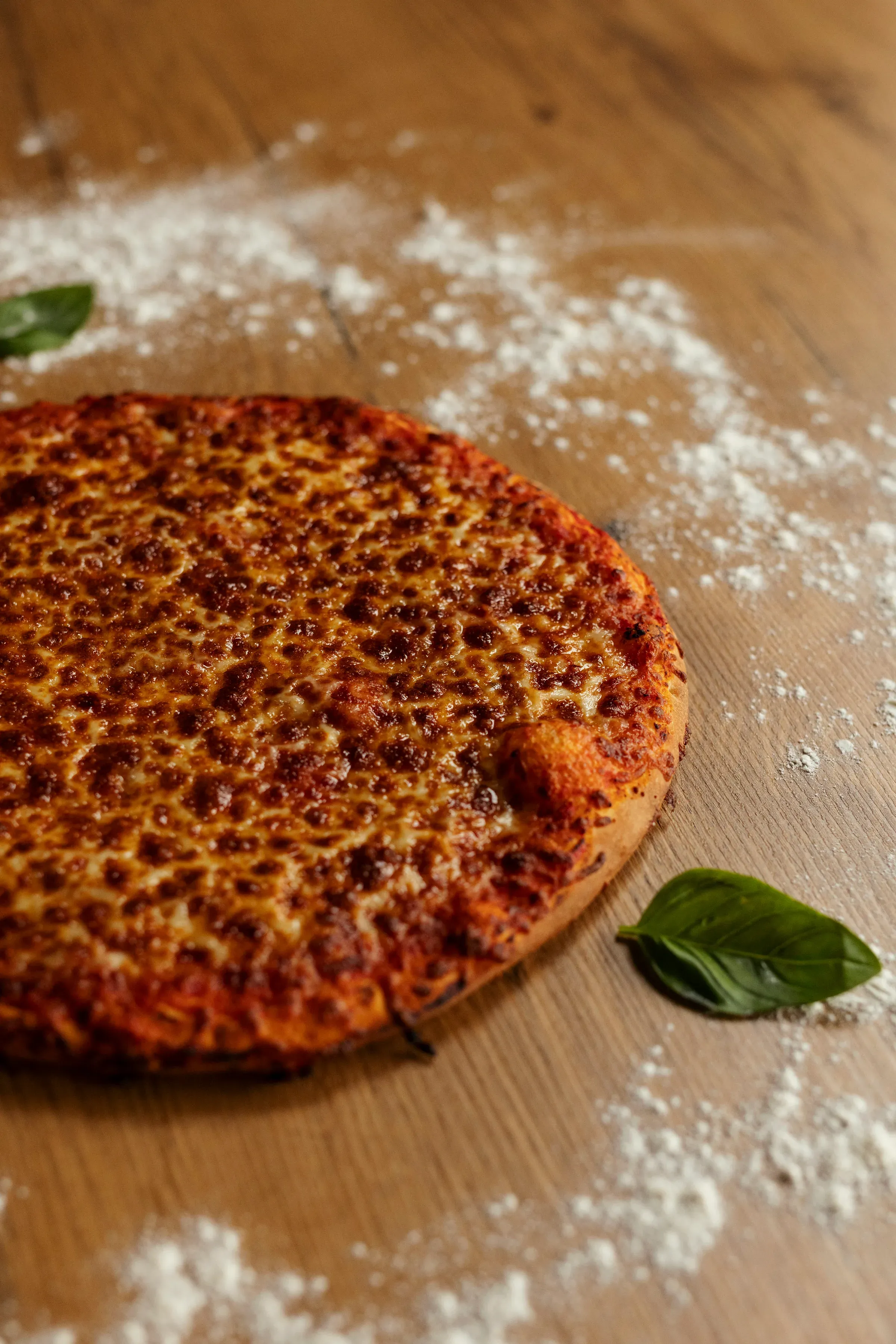 Fresh margherita pizza from the conveyor oven at a Sydney event