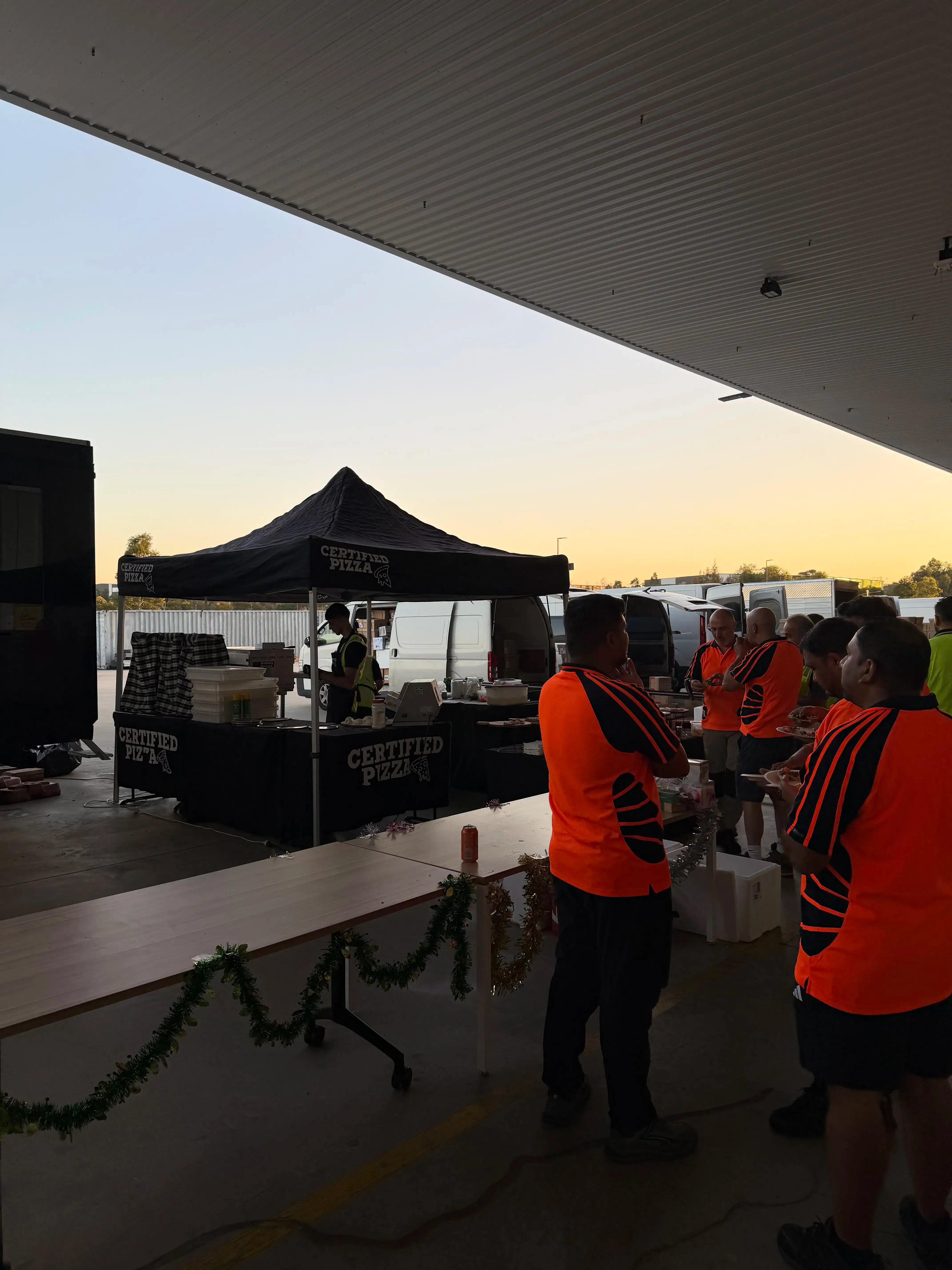 Certified Pizza Catering marquee and oven during daytime event setup