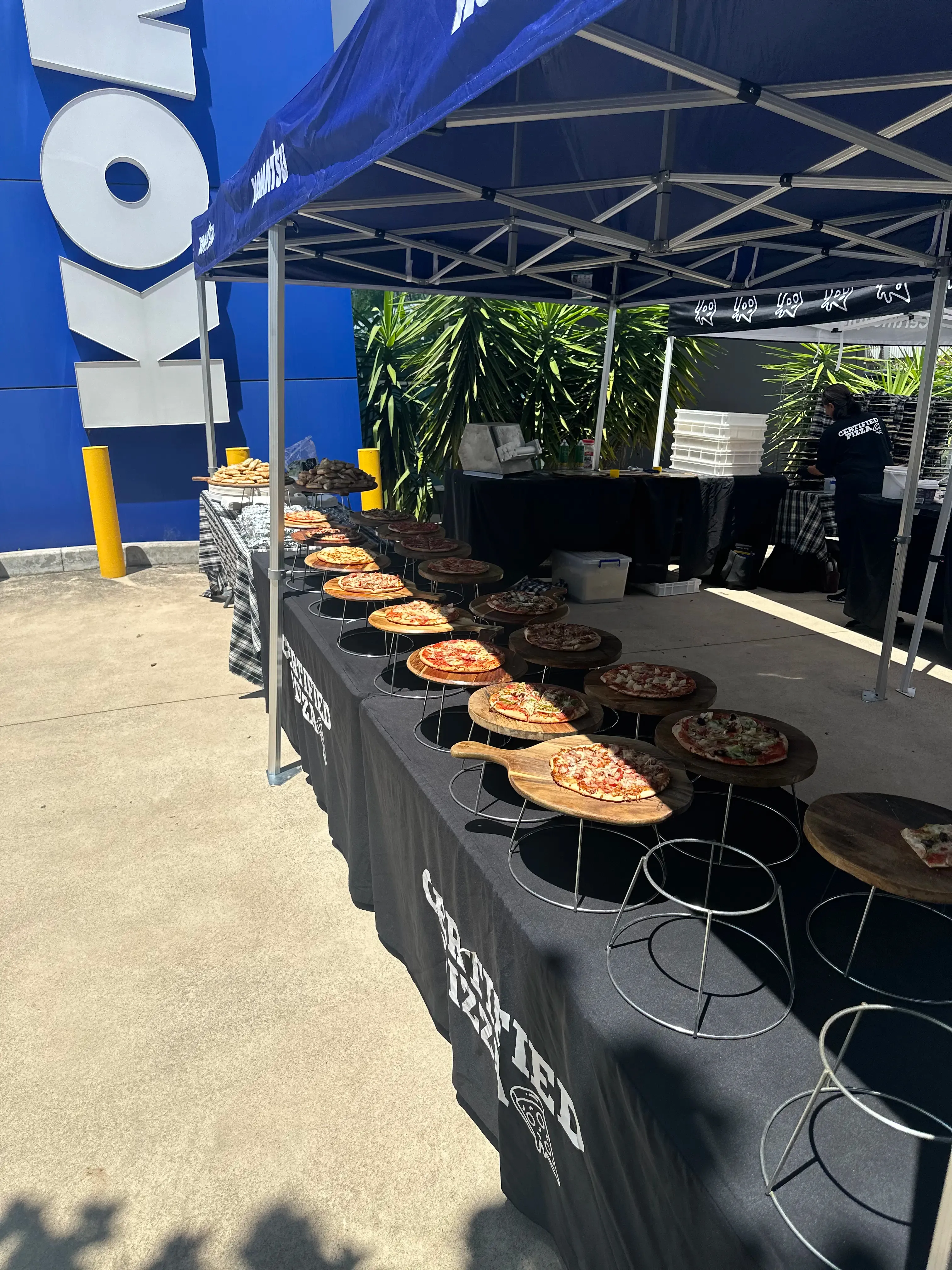 Certified Pizza team firing pizzas live at a Sydney catering event