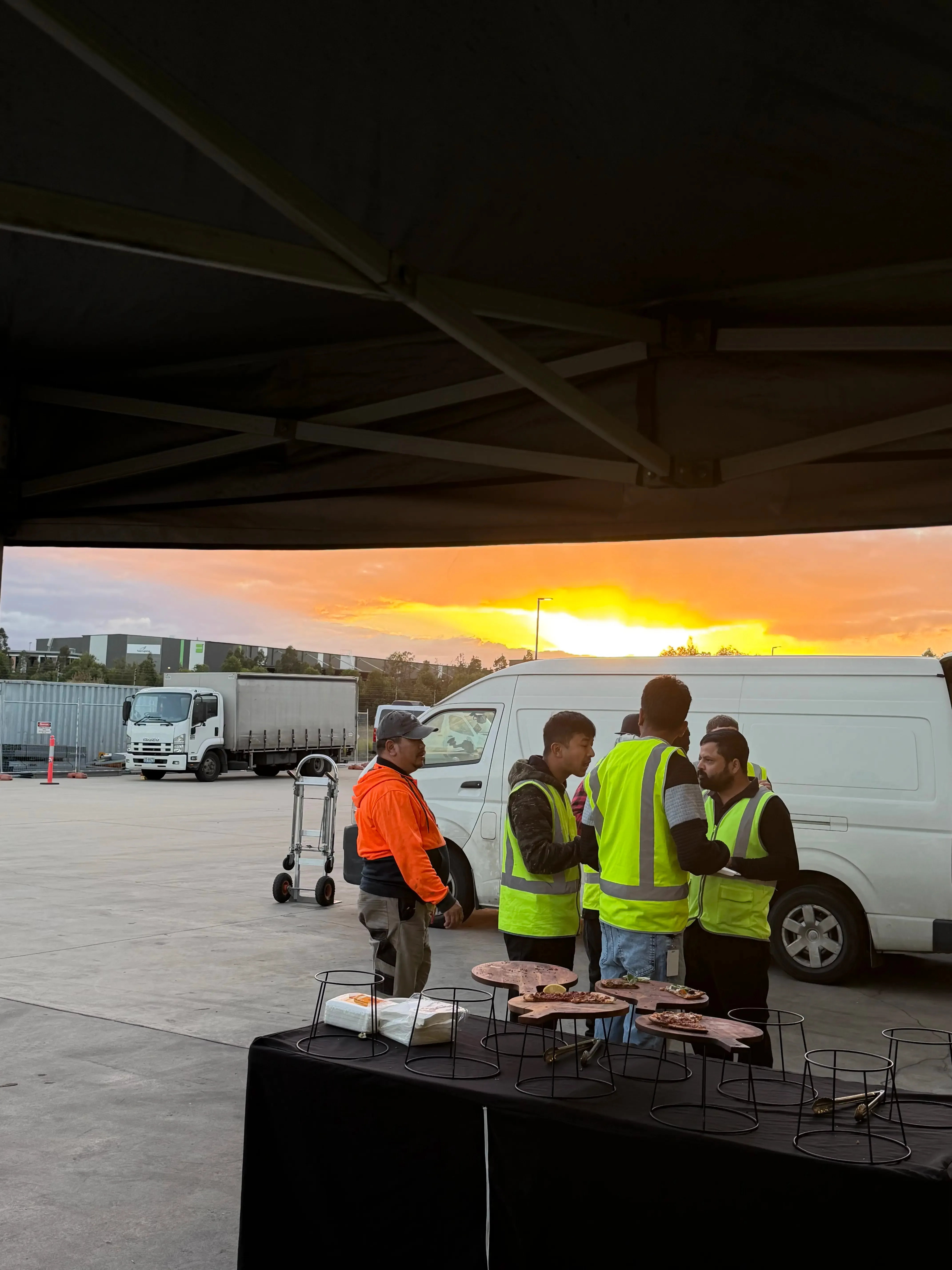 Certified Pizza staff serving guests at a Sydney catering event